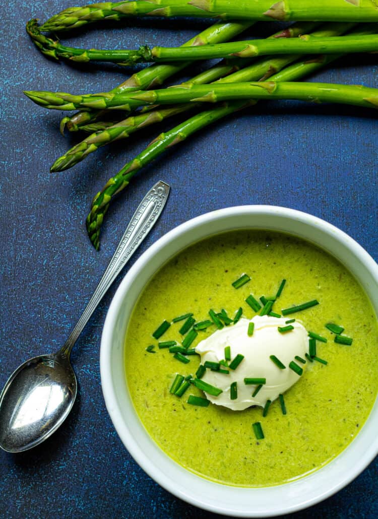 bowl of asparagus soup with chives