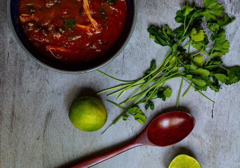 Photo of soup with limes and cilantro