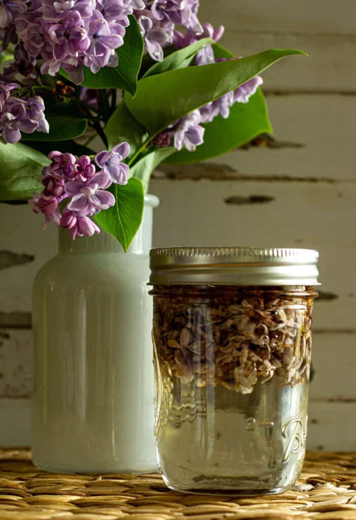 photo of a jar of lilac syrup