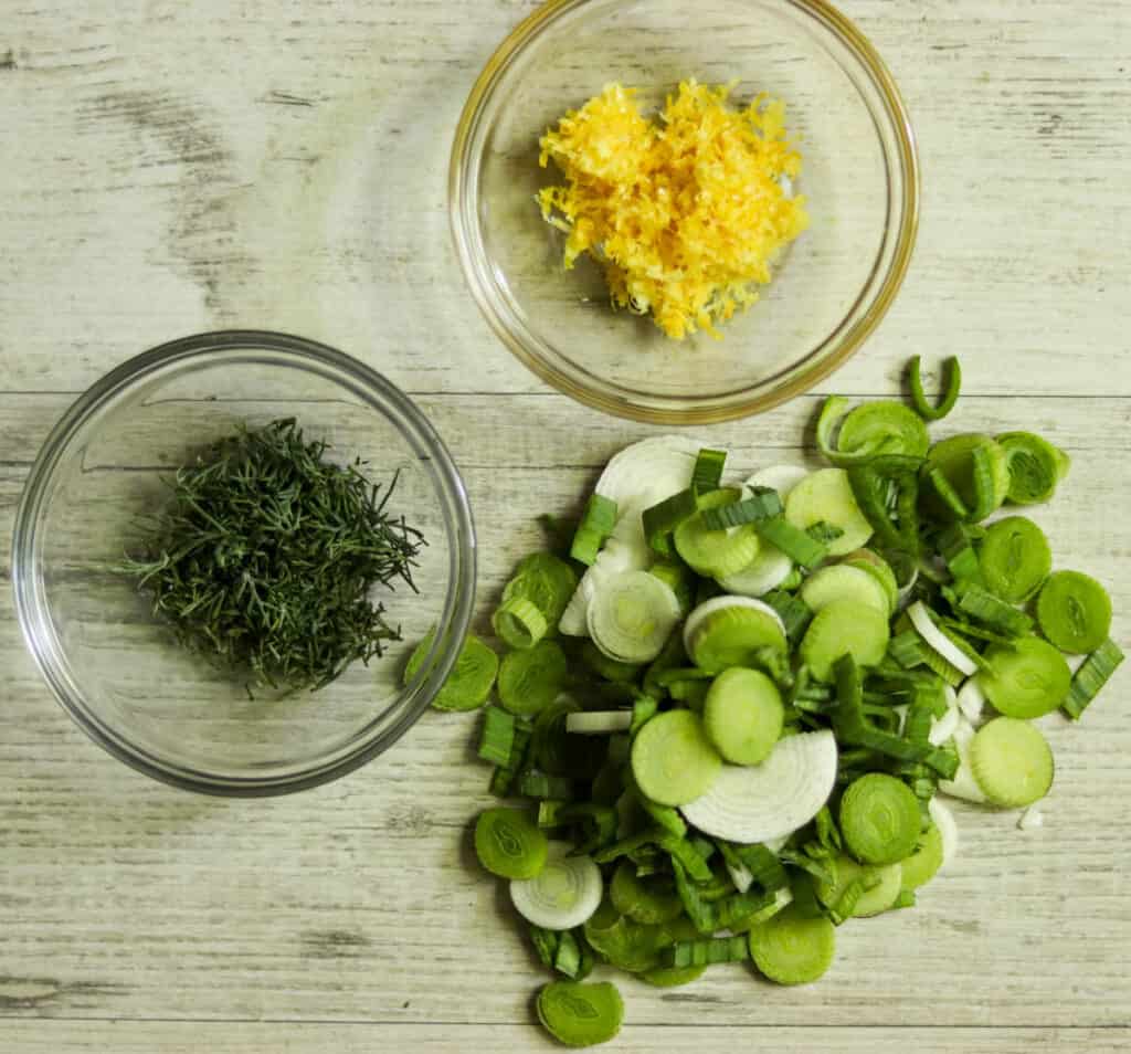 chopped spring onions with lemon zest and chopped dill