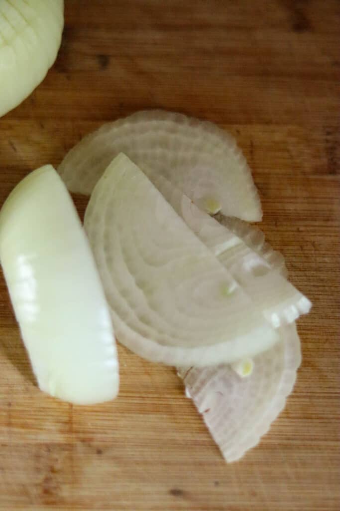 Thin sliced onions.