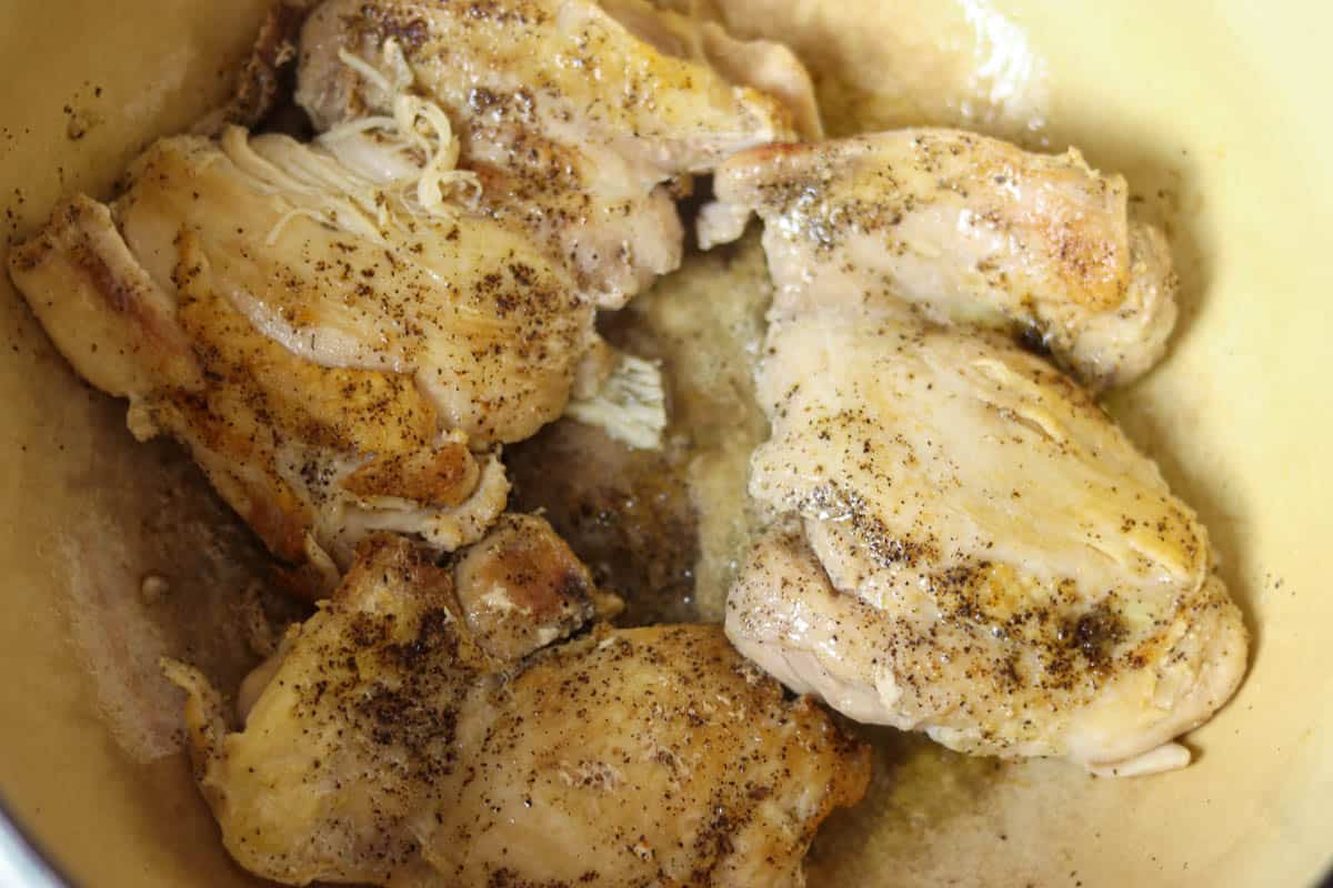 Browning the chicken thighs.