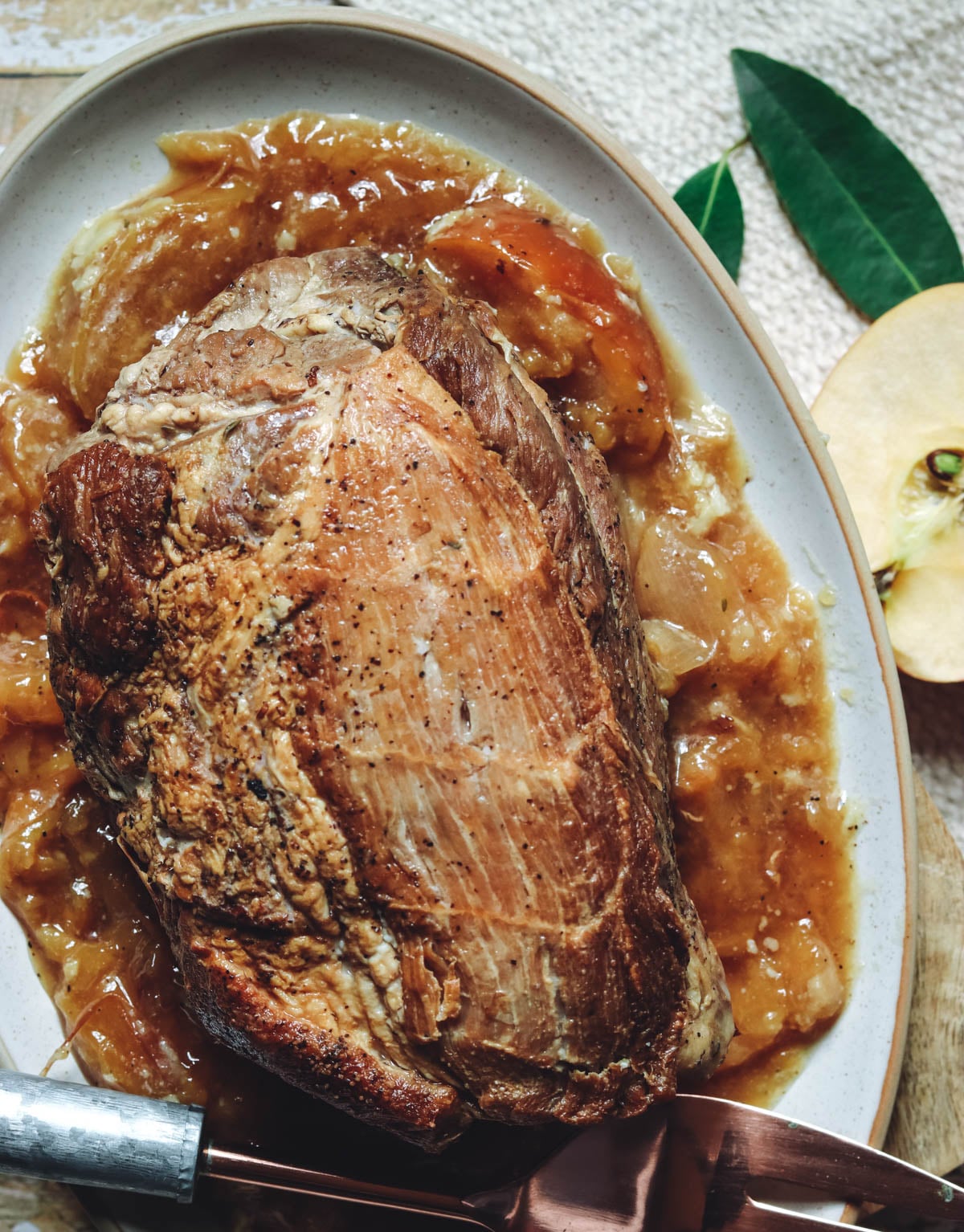 Pork Roast braised in apple cider with onions and apples.