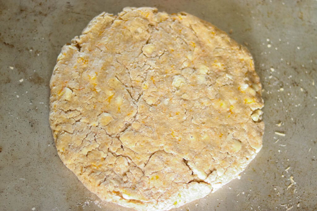 Shaping dough on a sheet pan.