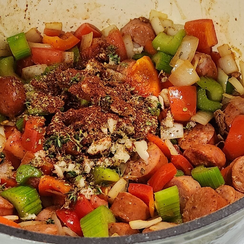 Adding the seasoning blend.